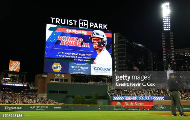 View of the scoreboard after Ronald Acuna Jr. #13 of the Atlanta Braves stole second base against Dansby Swanson of the Chicago Cubs in the 10th...