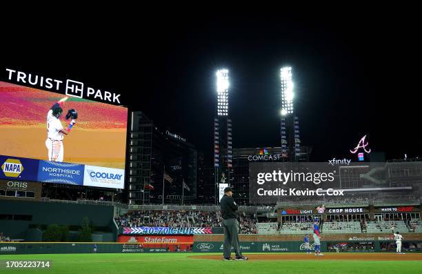 View of the scoreboard after Ronald Acuna Jr. #13 of the Atlanta Braves stole second base against Dansby Swanson of the Chicago Cubs in the 10th...