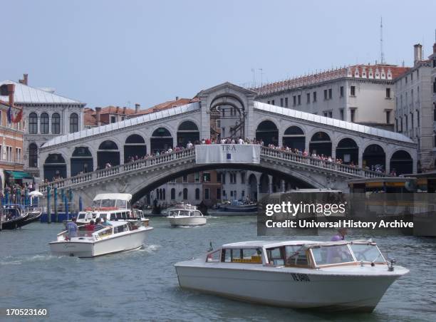 The Rialto Bridge is one of the four bridges spanning the Grand Canal in Venice, Italy. It is the oldest bridge across the canal, and was the...