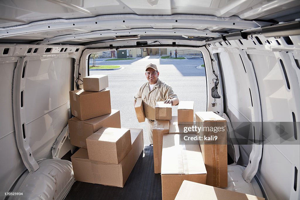 Hispanic man delivering packages