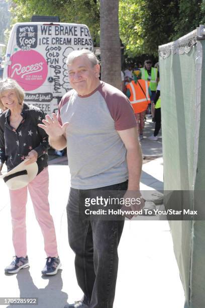 Patty McCormack and Dan Lauria walk the picket line at the SAG-AFTRA strike on October 3, 2023 at Warner Brothers Studios in Burbank, California.