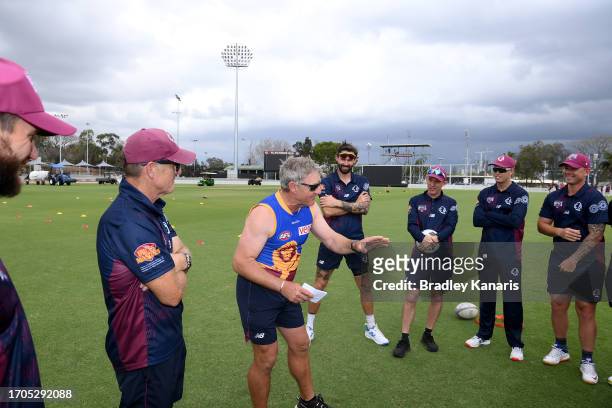 Andy Bichel of Queensland speaks to the players before the Marsh One Day Cup match between Queensland and South Australia at Allan Border Field, on...