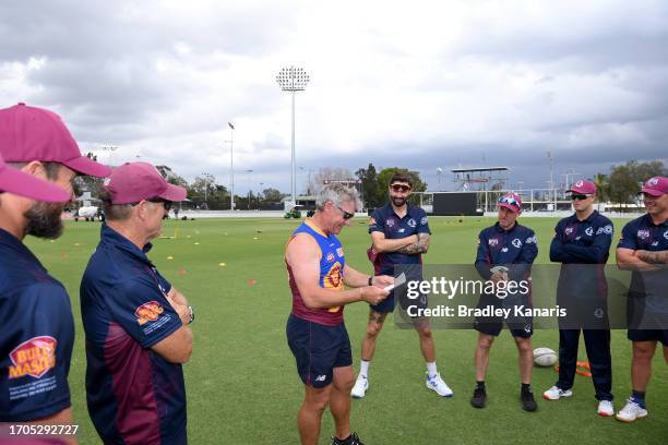 Andy Bichel of Queensland speaks to the players before the Marsh One Day Cup match between Queensland and South Australia at Allan Border Field, on...