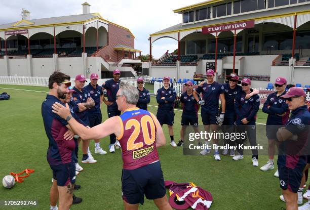 Andy Bichel of Queensland speaks to the players before the Marsh One Day Cup match between Queensland and South Australia at Allan Border Field, on...