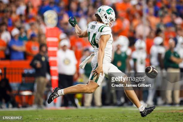 Grant Gonya of the Charlotte 49ers punts during the first half of a game against the Florida Gators at Ben Hill Griffin Stadium on September 23, 2023...
