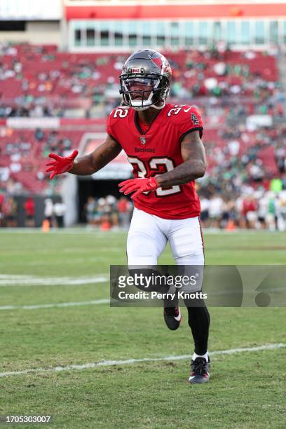 Chase Edmonds of the Tampa Bay Buccaneers warms up prior to an NFL football game against the Philadelphia Eagles at Raymond James Stadium on...