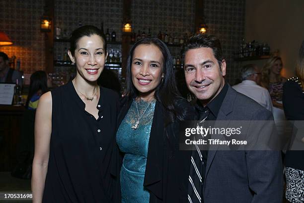 Actress Lisa Ling, Somaly Mam and Founder of Reality Cares Todd Michael Krim attends the Somaly Mam Foundation's "Disrupting Slavery" Benefit Gala at...