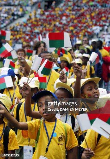 Children from Madagascar take part in a giant festival called by the French -Secours Populaire - charity organisation at the Stade de France stadium,...