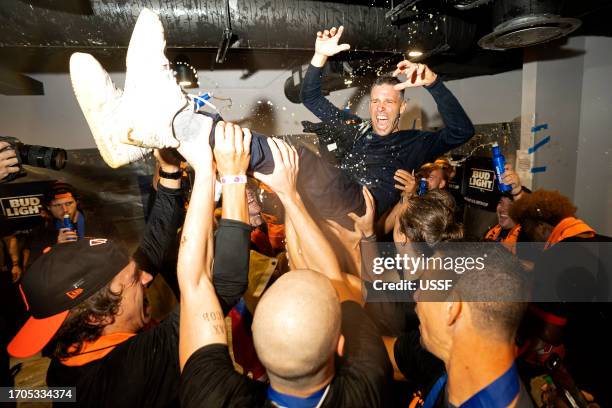 Houston Dynamo FC head coach Ben Olsen celebrates with his team in the locker room after winning the 2023 U.S. Open Cup Final against the Inter Miami...