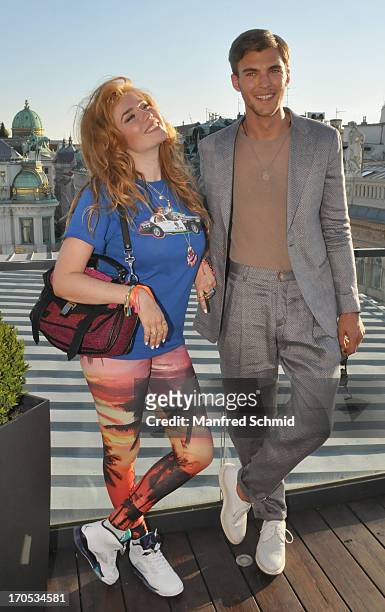 Palina Rojinskis and Patrick Kafka pose for a photograph during the Vienna Fashion Night on June 12, 2013 in Vienna, Austria.