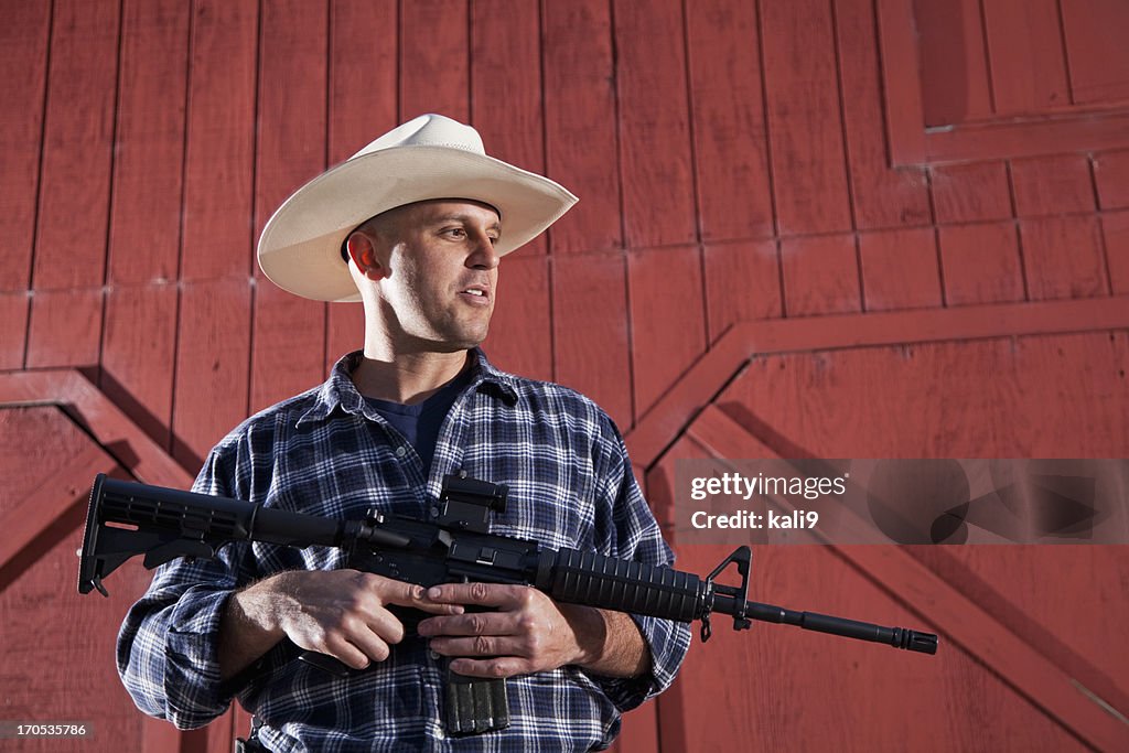 Man holding rifle