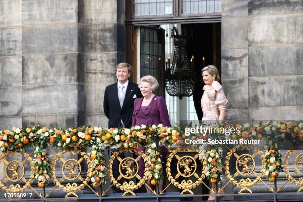 King Willem Alexander, Princess Beatrix of the Netherlands and Queen Maxima appear on the balcony of the Royal Palace to greet the public after her...