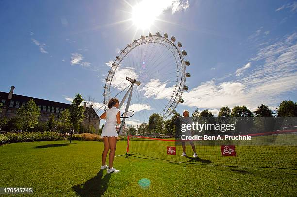 Laura Robson and Sir Richard Branson attend a photocall to celebrate the start of the Wimbledon championships with Virgin Active at London Eye on...