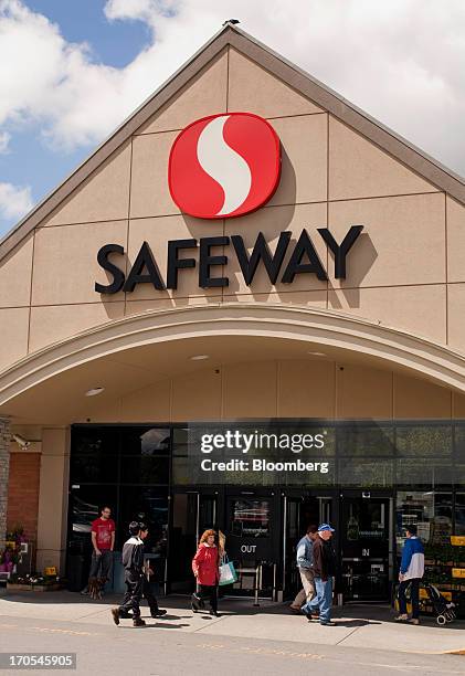 Customers enter and exit a Safeway Inc. Grocery store in Vancouver, British Columbia, Canada, on Thursday, June 13, 2013. Safeway Inc., the...