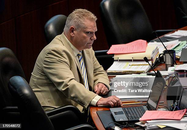 Toronto councillor Doug Ford gestures in council chambers. Earlier today Toronto Police launched a massive predawn raid, as part of Project...