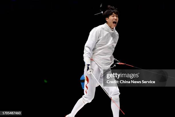 Xu Jie of Team China reacts in the Final against Team South Korea in the Fencing - Men's Foil Team on day four of the 19th Asian Games at Hangzhou...