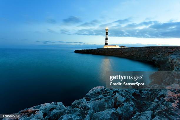 lighthouse - ocean dusk stock pictures, royalty-free photos & images