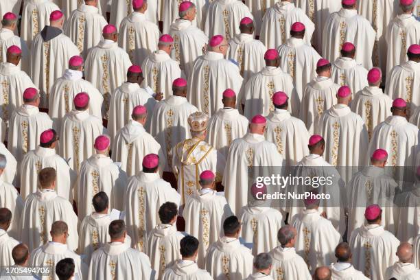 Priests and bishops attend a Holy Mass led by Pope Francis with the new Cardinals at the opening of the XVI Ordinary General Assembly of the Synod of...