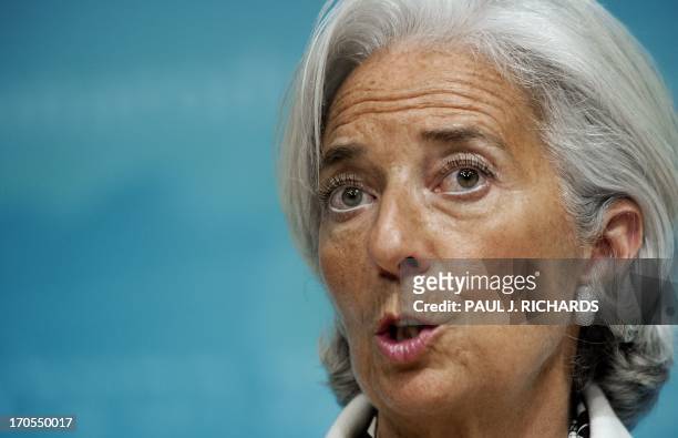 Christine Lagarde, Managing Director of International Monetary Fund, delivers remarks on the US economy during a press conference June 14, 2013 at...
