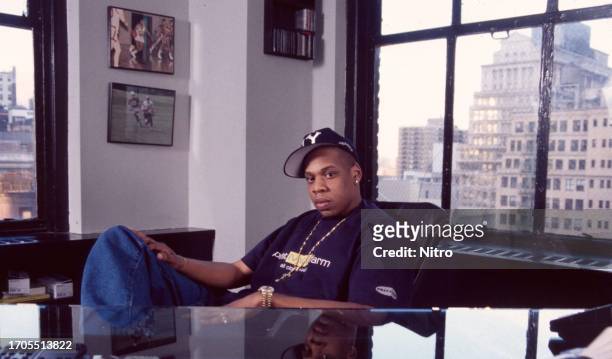 Portrait of American rapper and music executive Jay Z as he sits behind a desk in his lower Manhattan office, New York, New York, April 1996.