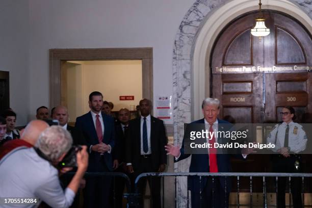 Former U.S. President Donald Trump speaks to the media as he appears for his civil fraud trial at New York State Supreme Court on October 04, 2023 in...
