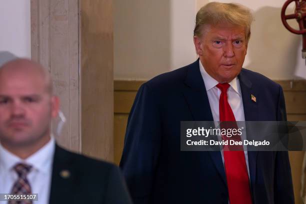 Former U.S. President Donald Trump appears for his civil fraud trial at New York State Supreme Court on October 04, 2023 in New York City. Former...