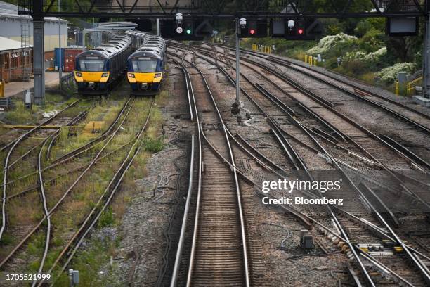 Stationary passenger trains near empty railway tracks near the Grove Park Sidings, during a strike by train drivers, in London, UK, on Wednesday,...