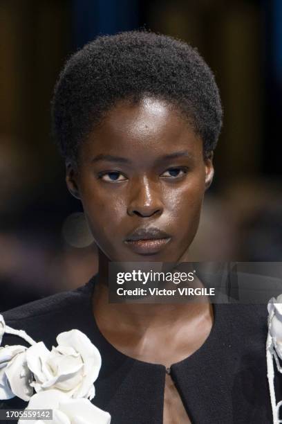 Model walks the runway during the Balmain Ready to Wear Spring/Summer 2024 fashion show as part of the Paris Fashion Week on September 27, 2023 in...