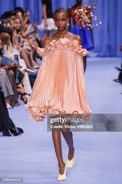 Model walks the runway during the Balmain Ready to Wear Spring/Summer 2024 fashion show as part of the Paris Fashion Week on September 27, 2023 in...