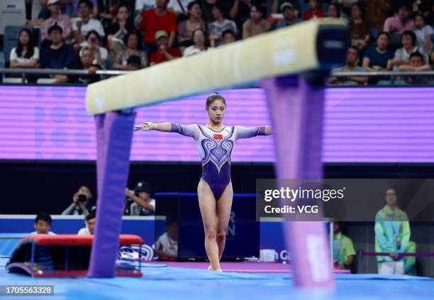 Zuo Tong of Team China competes on the Balance Beam in the Artistic Gymnastics - Women's All-Around Final on day four of the 19th Asian Games at...