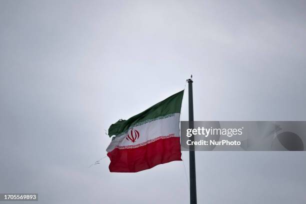 An Iran flag waves at a park in northwestern Tehran, October 3, 2023.