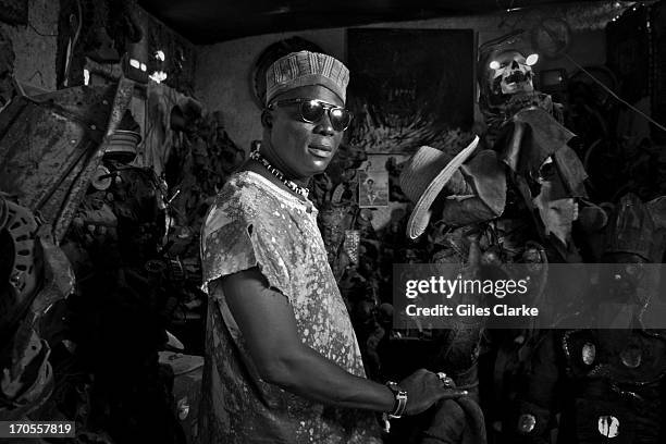 Andre Eugene , a founder of the art collective, 'Atiz Reziztans', poses for a portrait in his studio March 20, 2013 in Port-au-Prince, Haiti. Eugene...