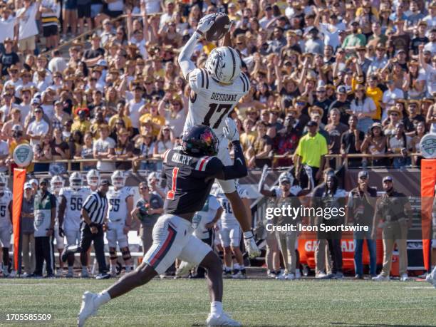 Western Michigan Broncos wide receiver Malique Dieudonne completes a pass against Ball State Cardinals defensive back Aljareek Malry during the...