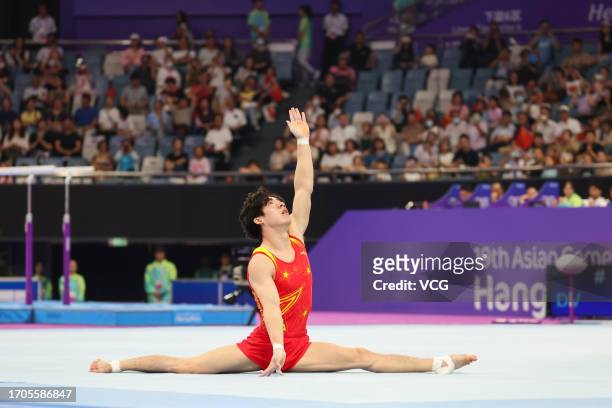 Zhang Boheng of Team China competes on the Floor in the Artistic Gymnastics - Men's All-Around Final on day three of the 19th Asian Games at...