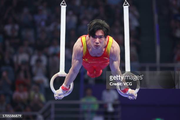 Zhang Boheng of Team China competes on the Rings in the Artistic Gymnastics - Men's All-Around Final on day three of the 19th Asian Games at...