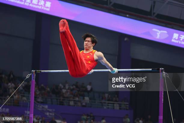 Zhang Boheng of Team China competes on the Horizontal Bar in the Artistic Gymnastics - Men's All-Around Final on day three of the 19th Asian Games at...