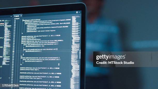closeup young asian man software developers mentor leader manager talking to executive team analyzing source code in office at night. programmer development. - python code stock pictures, royalty-free photos & images