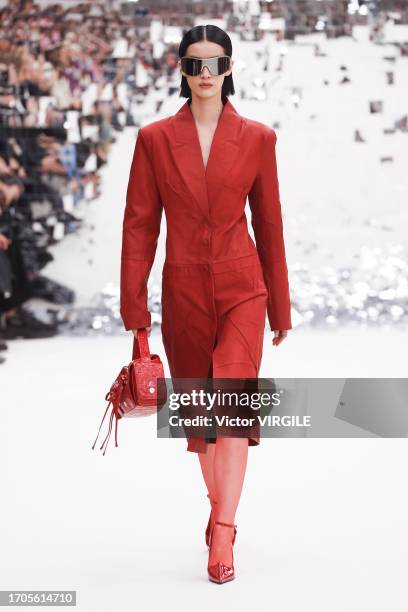 Model walks the runway during the Acne Ready to Wear Spring/Summer 2024 fashion show as part of the Paris Fashion Week on September 27, 2023 in...