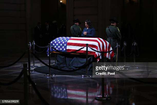 Mayor London Breed prays over the casket of Senator Dianne Feinstein at San Francisco City Hall before a public viewing on October 4, 2023 in San...