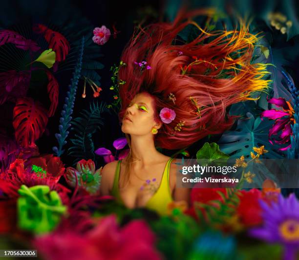 young beautiful woman in night blossom jungle - ravenala stock pictures, royalty-free photos & images