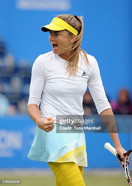 Daniela Hantuchova of Slovakia celebrates winning a break of serve in the tie break during her Quarter Final match against Francesca Schiavone of...