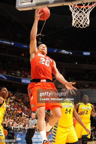 Brandon Triche of the Syracuse Orange goes for a layup during the East Regional Round Final of the 2013 NCAA Men's Basketball Tournament game against...