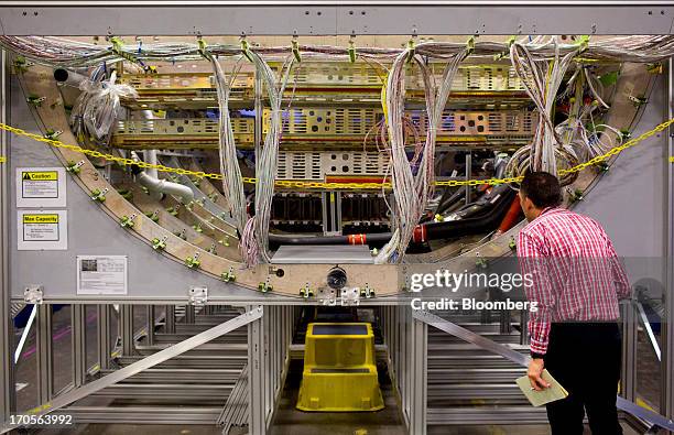 Mock up of the lower section of a Boeing Co. 737 sits on display at the company's factory in Renton, Washington, U.S., on Thursday, May 30, 2013....