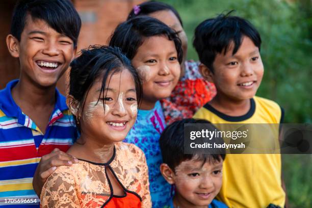 group of burmese children posing in bagan - myanmar boy stock pictures, royalty-free photos & images