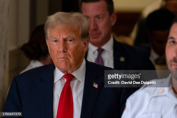 Former President Donald Trump steps out of court during a afternoon break on the third day of his civil fraud trial at New York State Supreme Court...