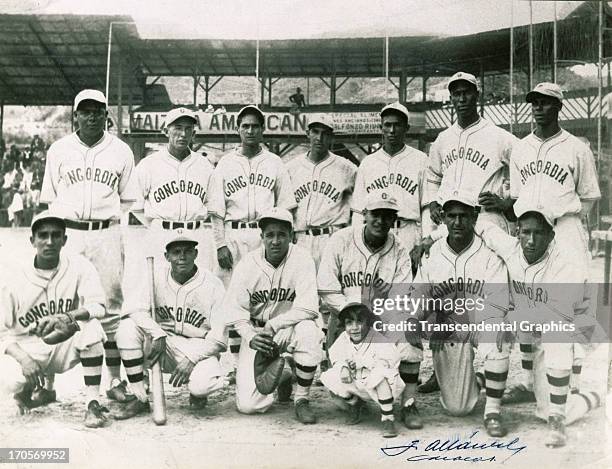 The Concordia Baseball Team poses for the annual portrait in 1933 in the ball park in Caracas, Venezuela. Hall of Fame star Martin Dihigo stands far...