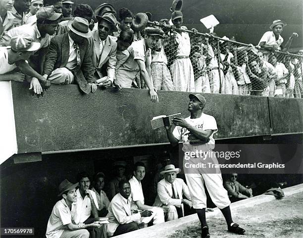 Jackie Robinson, foreground, and the Brooklyn Dodgers are at spring training in this photo taken in Ciudad Trujillo , Dominican Republic, March 1948.