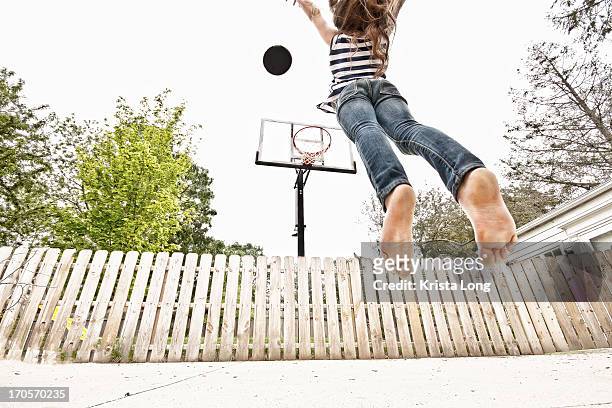 a girl playing basketball - girl soles stock pictures, royalty-free photos & images