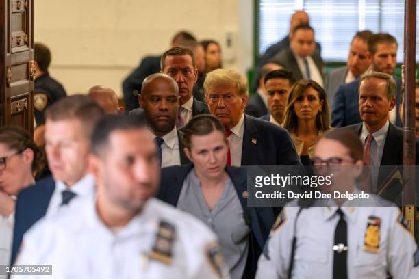 Former President Donald Trump steps out of court during an afternoon break on the third day of his civil fraud trial at New York State Supreme Court...