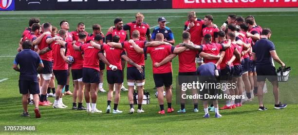 Italy gather around head coach Kieran Crowley during the Italy captain's run ahead of their Rugby World Cup France 2023 match against New Zealand at...